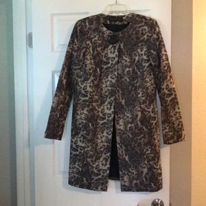 Light animal print coat by Dana buchman